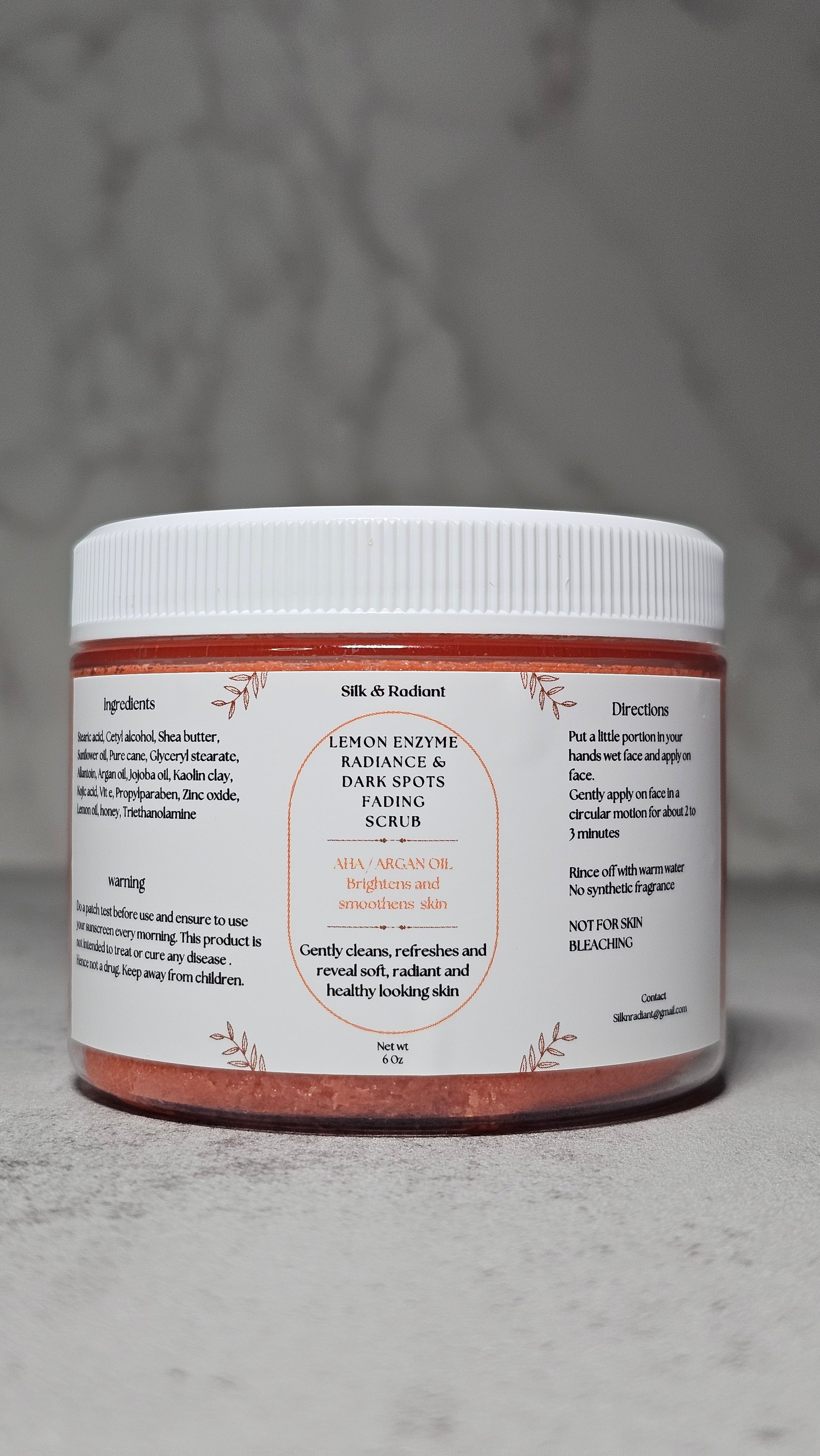 Radiance and dark spots fading scrub